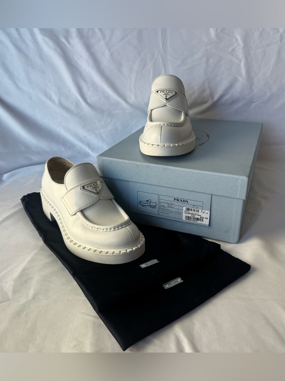 Prada Spazzolato Metal Triangle Logo Leather White Loafers  Size 37 Authentic